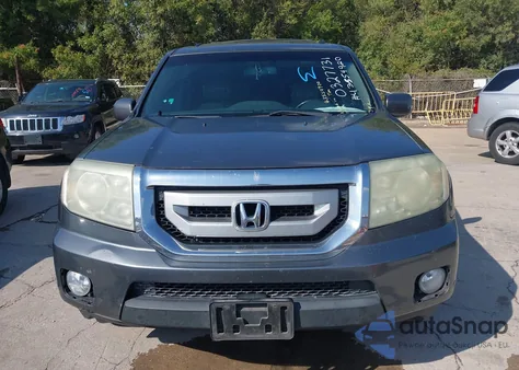 2010 Honda Pilot Touring z USA, uszkodzony, nr VIN 5FNYF4H91AB032731